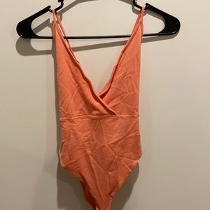 Crisscrossed bodysuit